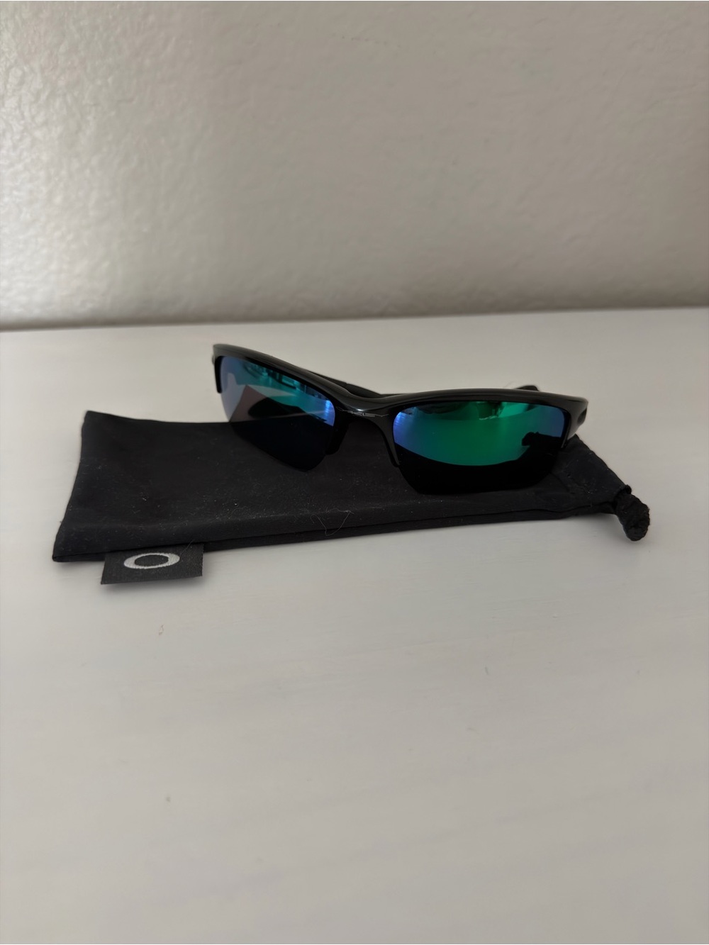 Oakley Men's Black Frame Sunglasses with Blue-Green Mirrored Lenses